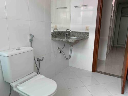 Et badeværelse på Casa de Praia 3 Suítes c Ar condicionado e Piscina à 350m da Praia do Morro