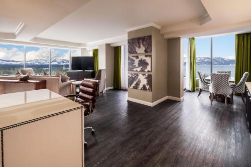 a living room with a view of the ocean at Caesars Republic Lake Tahoe in Stateline