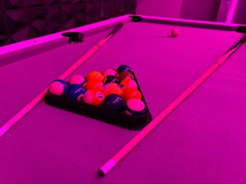 a box of billiard balls on a pool table at Toller Heights in Bradford