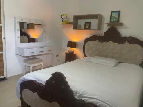Postel nebo postele na pokoji v ubytování Hostal los profes