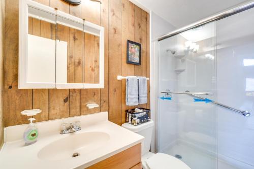 a bathroom with a sink and a shower at Hot Tub and Mountain Views at Gatlinburg Cabin! in Gatlinburg