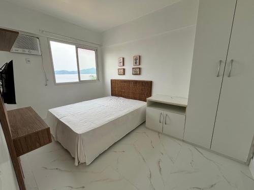 Ένα ή περισσότερα κρεβάτια σε δωμάτιο στο Porto Real Resort