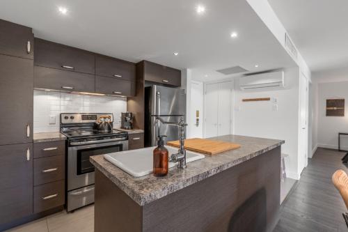 Η κουζίνα ή μικρή κουζίνα στο Le condo des Neiges