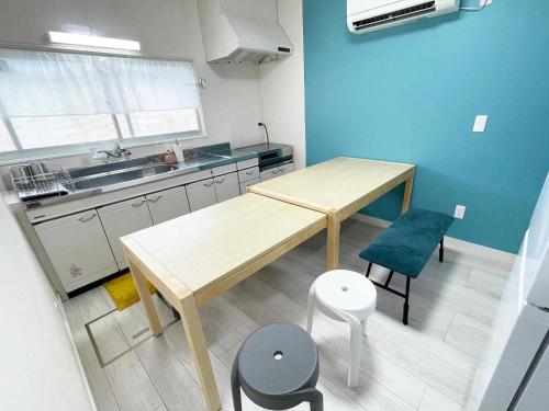 Kuchyň nebo kuchyňský kout v ubytování KOKOYUI GUESTHOUSE Taiji