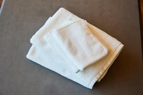 a white napkin sitting on top of a table at Hub-Fun in Katsuno