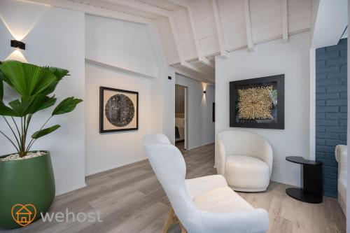 Χώρος καθιστικού στο Nago Hometel Boutique
