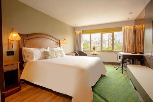 Ένα ή περισσότερα κρεβάτια σε δωμάτιο στο InterContinental Medellin - Movich by IHG