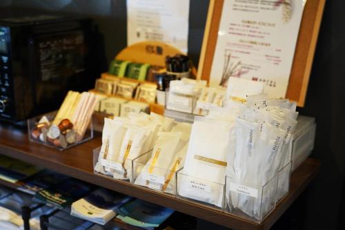 a display case in a store filled with lots of products at Hotel Chino in Chino