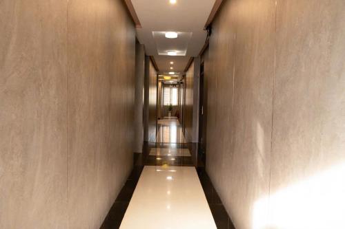 a corridor of a hallway with a long hallway at Ngoc Se Hotel in Pleiku
