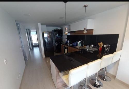 Kuchyň nebo kuchyňský kout v ubytování apartamento vista al lago