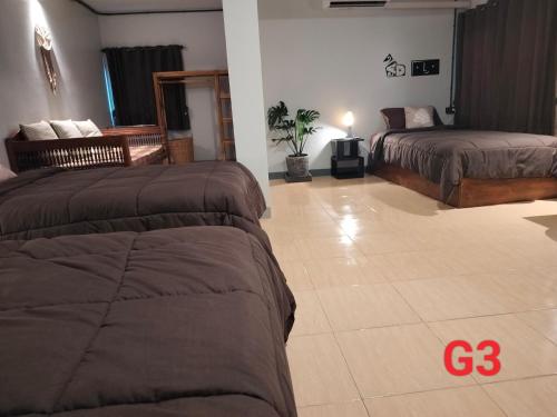 Postel nebo postele na pokoji v ubytování Oldy De Garden