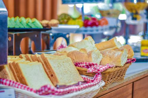 a basket of bread on a counter in a store at The Lokha Legian Resort & Spa in Legian