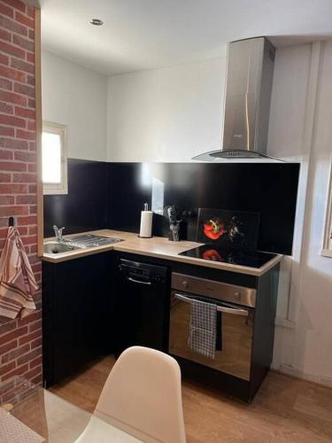 Una cocina o cocineta en Appartement avec vue imprenable et tout le confort