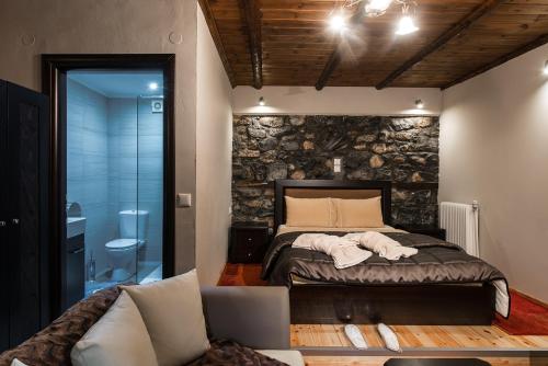 Ένα ή περισσότερα κρεβάτια σε δωμάτιο στο Hotels Voras