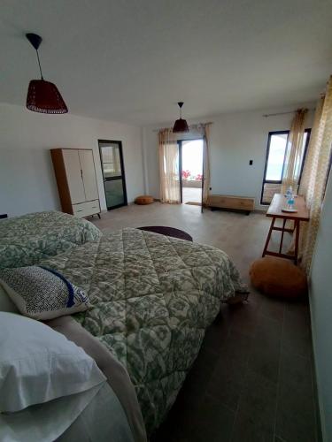 Ένα ή περισσότερα κρεβάτια σε δωμάτιο στο LA SIESTA Suites