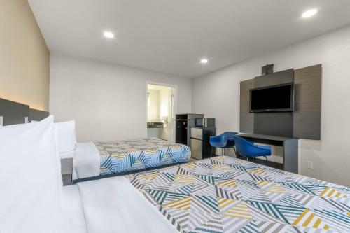 Ένα ή περισσότερα κρεβάτια σε δωμάτιο στο Motel 6-Willows, CA