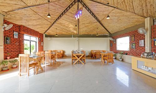 Un lugar para sentarse en Corbett The Serene By Sukhmani Resorts