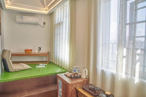 Φωτογραφία από το άλμπουμ του Lijiang Joland Guest House σε Λιγιάνγκ