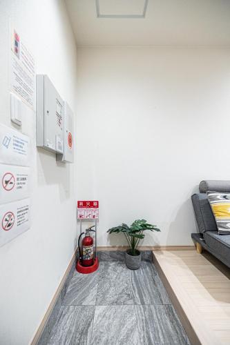Una cocina o cocineta en 住吉メリー4階建戸建て 最大16人まで! 住吉大社徒歩圏内 梅田奈良関空まで直行