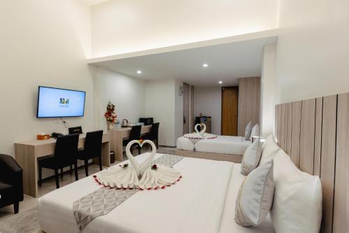 Μια τηλεόραση ή/και κέντρο ψυχαγωγίας στο SUBANAN Residence Hatyai - ทรัพย์อนันต์ เรสซิเด้นซ์ หาดใหญ่