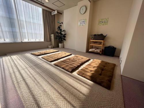 Postel nebo postele na pokoji v ubytování カプセル&サウナ日本 -男性専用 men only-