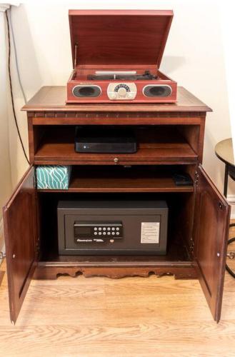 a wooden stand with a microwave and a radio at Mt Washington #1 on Grandview at Gazebo Park in Pittsburgh