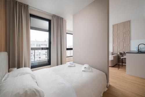 Foto Grzybowska 13th Floor Glamour Apartment by BookingHost 2