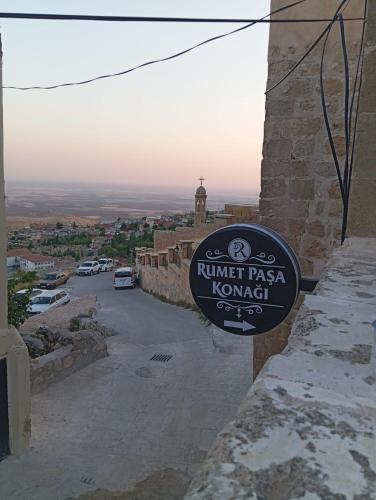 a sign on the side of a building at Rumetpaşakonağı in Mardin