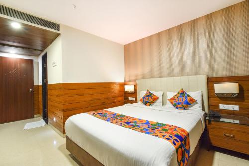 Giường trong phòng chung tại Oriva Millennium Grand