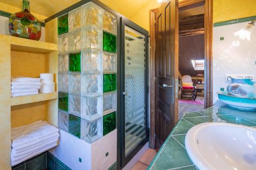 a bathroom with a shower and a sink at Casa Da Puza in Forcarei