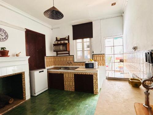 Kuchyň nebo kuchyňský kout v ubytování Casa Noble Jabugo