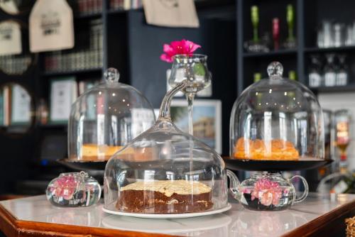 a display of cakes in clason jars on a counter at The Willets Boutique Hotel in Simon's Town in Simonʼs Town