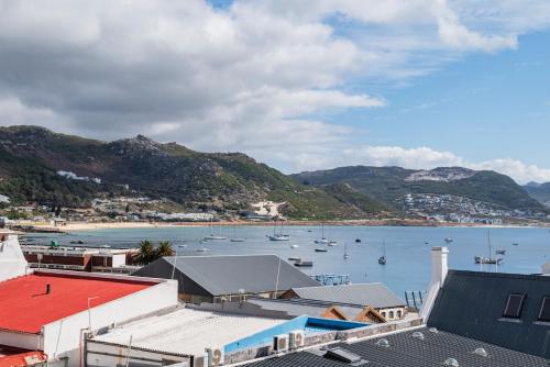 a view of a harbor with boats in the water at The Willets Boutique Hotel in Simon's Town in Simonʼs Town