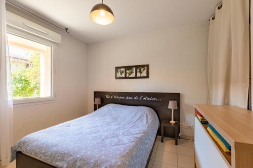 Postel nebo postele na pokoji v ubytování Le Clos d'Azille - Appt pour 6 personnes