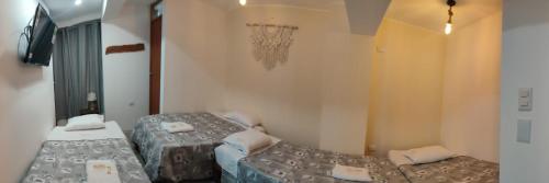 Ένα ή περισσότερα κρεβάτια σε δωμάτιο στο Velilu Luxury