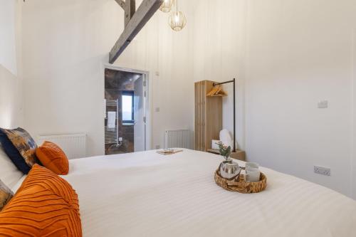 En eller flere senge i et værelse på Manor