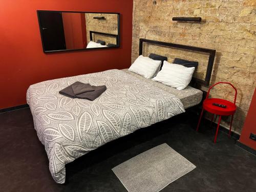 Postel nebo postele na pokoji v ubytování ApartHotel Riga
