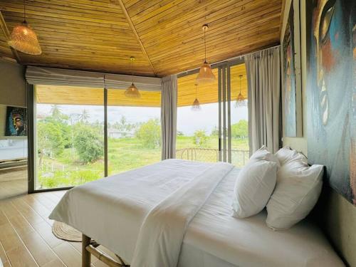 Postel nebo postele na pokoji v ubytování Lovely Villa, 2 Bedrooms & 1 Studio Room, Koh Samui