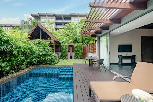 Bazén v ubytování Anantara Mai Khao Phuket Villas nebo v jeho okolí
