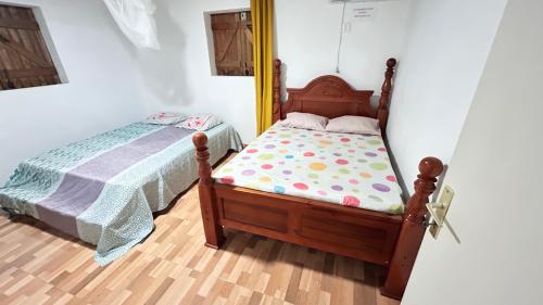 Postel nebo postele na pokoji v ubytování Mangrove