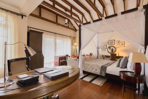 Ένα ή περισσότερα κρεβάτια σε δωμάτιο στο Hemingways Nairobi