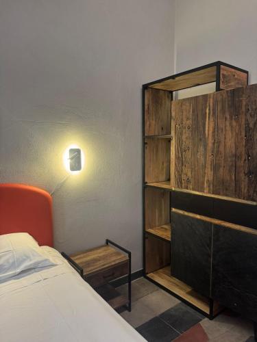 Ένα ή περισσότερα κρεβάτια σε δωμάτιο στο Borgo Ripa Urban Travel