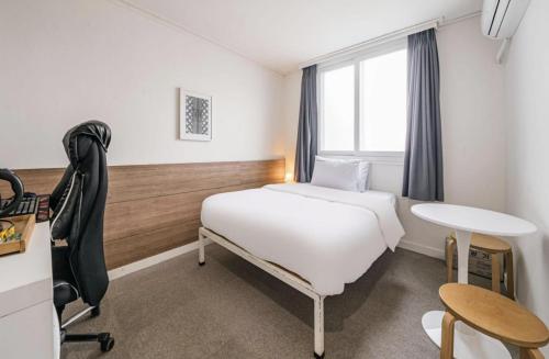 Katil atau katil-katil dalam bilik di Gaon J Stay Hotel