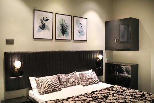 Postel nebo postele na pokoji v ubytování De Leisure Homes