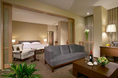 Postel nebo postele na pokoji v ubytování City Suites - Taoyuan Gateway