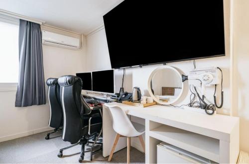 Televisyen dan/atau pusat hiburan di Gaon J Stay Hotel
