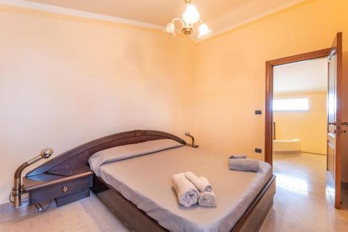 Ένα ή περισσότερα κρεβάτια σε δωμάτιο στο Villa dell'edera