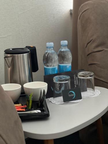 Příslušenství pro přípravu čaje a kávy v ubytování Hotel DoZari