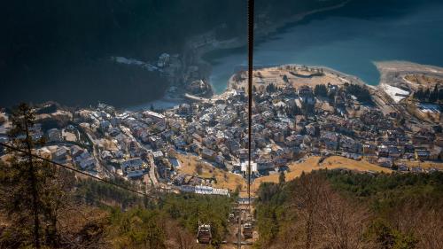 an aerial view of a town on a mountain at Hotel Lory - Molveno - Dolomiti in Molveno