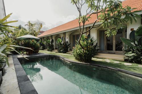 Bazén v ubytování D'Leafy Seminyak nebo v jeho okolí